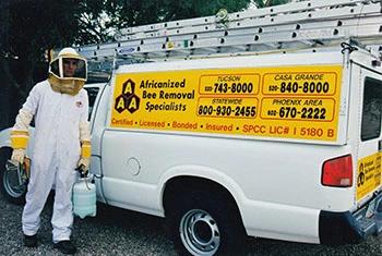 Nogales bee removal service truck and employee